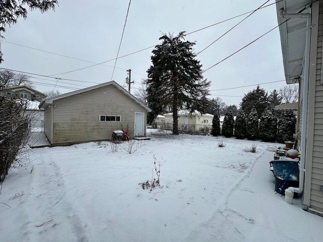 view of yard layered in snow