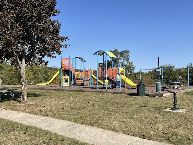 view of jungle gym with a lawn