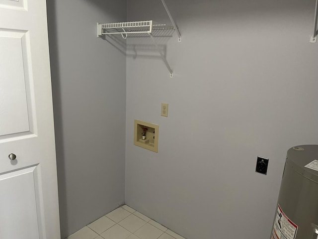 laundry area featuring hookup for a washing machine, light tile patterned floors, and hookup for an electric dryer