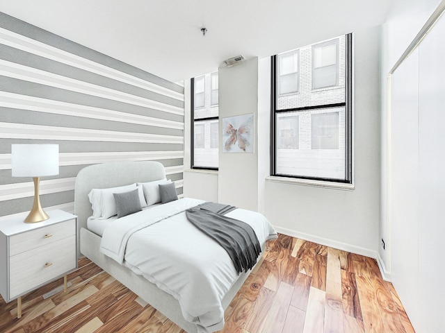 bedroom featuring light hardwood / wood-style floors