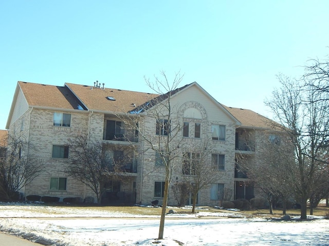 view of snow covered property