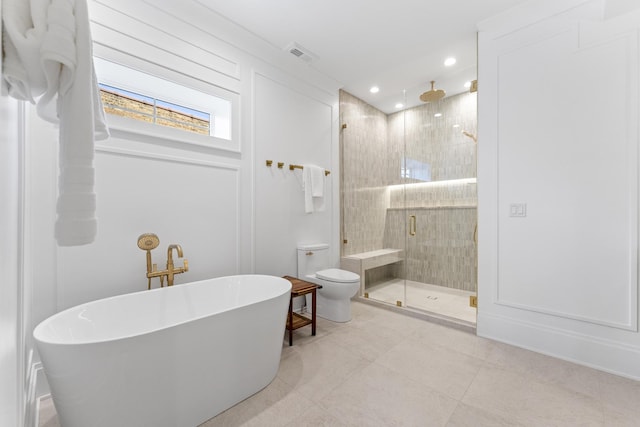 1254 W Norwood St, Chicago, IL 60660 - bathroom with a stall shower, toilet, visible vents, recessed lighting, and a freestanding tub
