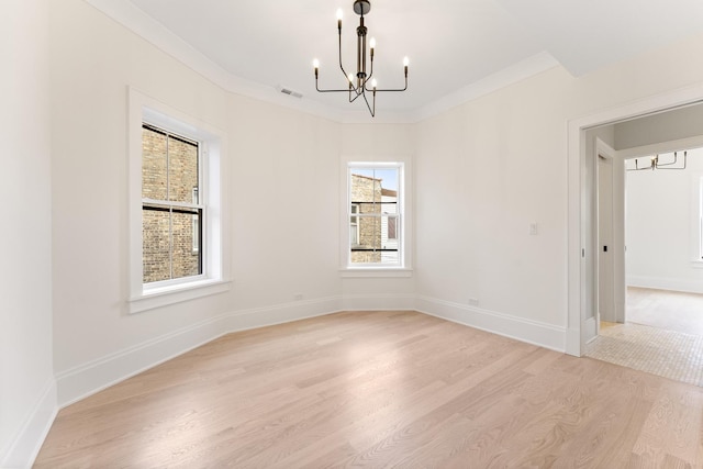 1254 W Norwood St, Chicago, IL 60660 - unfurnished room featuring baseboards, a notable chandelier, visible vents, and light wood-type flooring