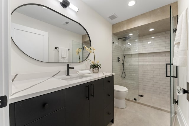 1254 W Norwood St, Chicago, IL 60660 - full bathroom featuring vanity, toilet, a stall shower, and visible vents