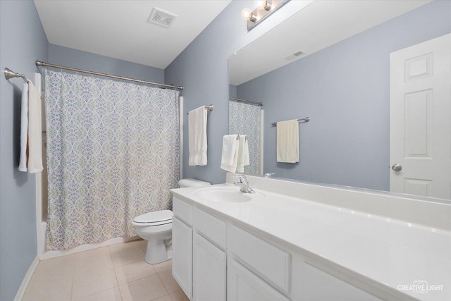 full bathroom with tile patterned floors, toilet, shower / tub combo, and vanity