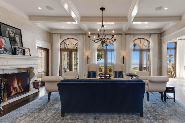 living room with french doors, coffered ceiling, and beam ceiling