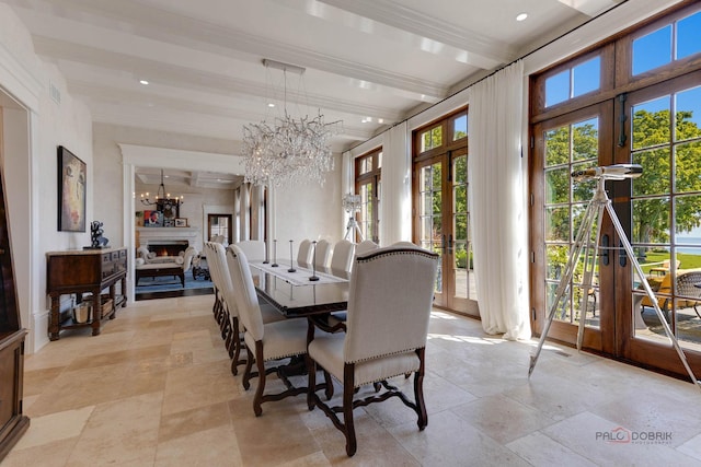 dining area with a chandelier, french doors, and beamed ceiling