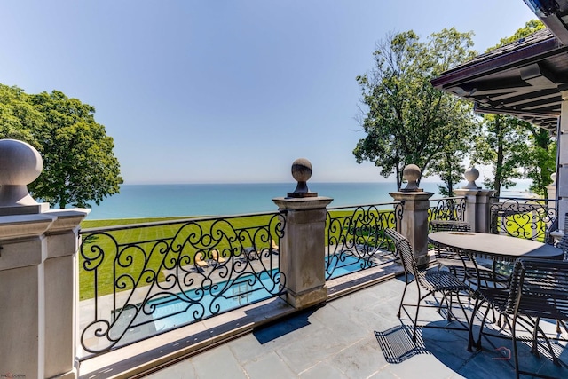 view of patio featuring a water view