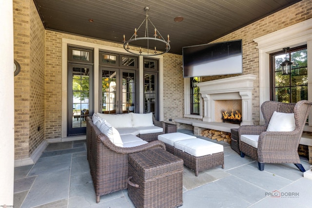 view of patio featuring an outdoor fireplace