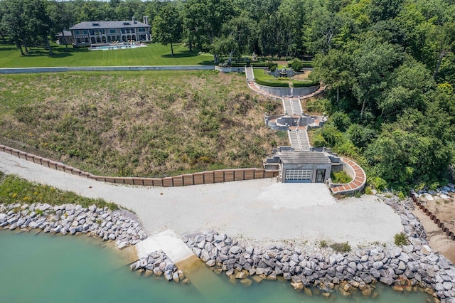 birds eye view of property featuring a water view