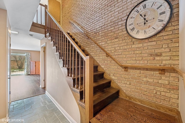 stairs with brick wall