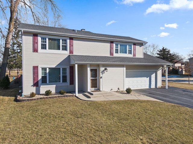 view of front facade featuring a garage and a front lawn