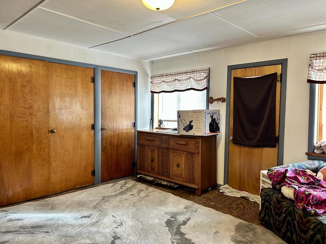 bedroom with two closets