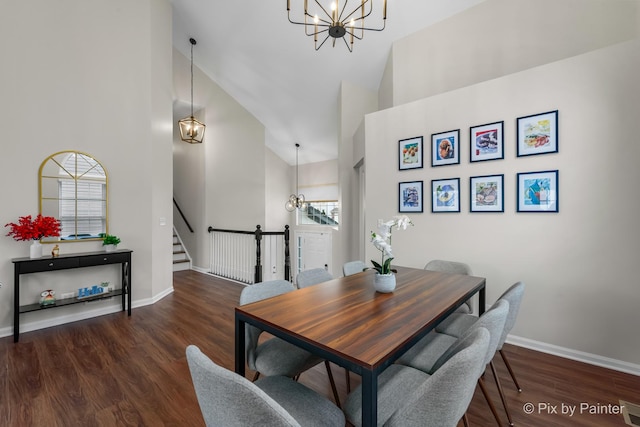 dining space featuring high vaulted ceiling, dark hardwood / wood-style floors, and a healthy amount of sunlight