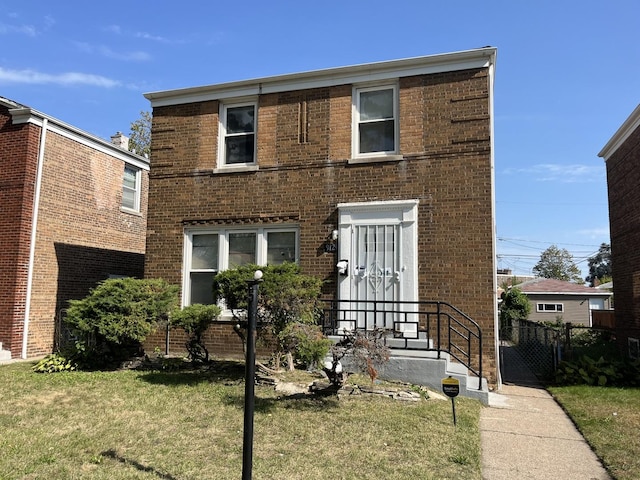 view of front of home featuring a front lawn