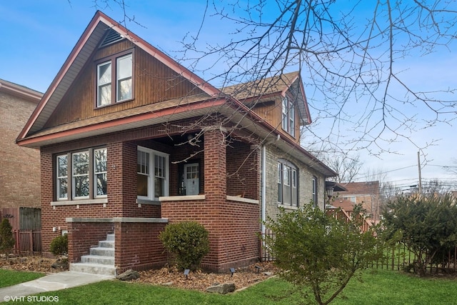 view of property exterior featuring a yard and brick siding