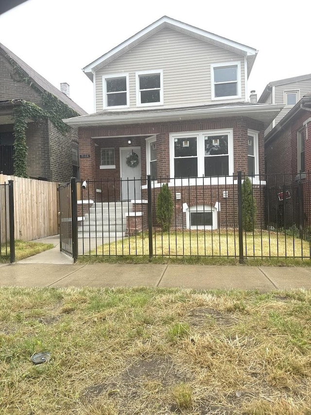 view of front of home featuring a front yard