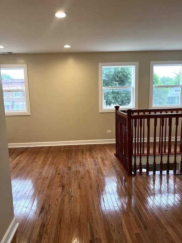 bedroom with dark wood-type flooring