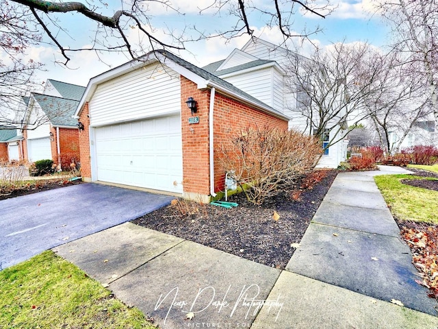 view of home's exterior featuring a garage