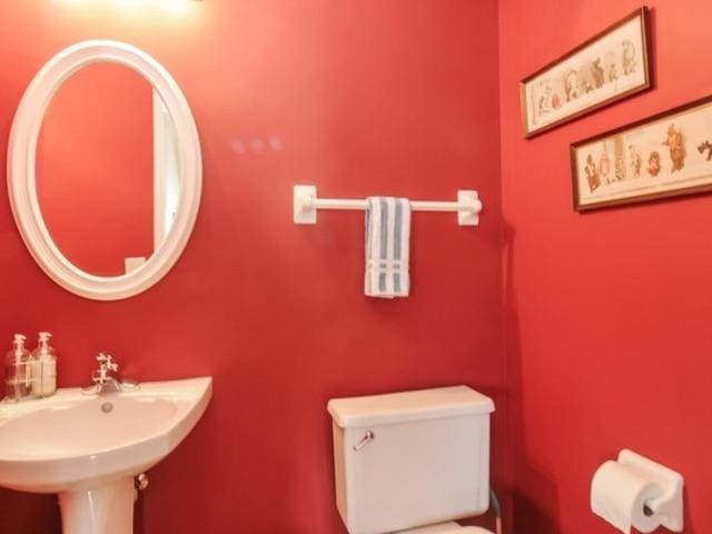 bathroom with sink and toilet