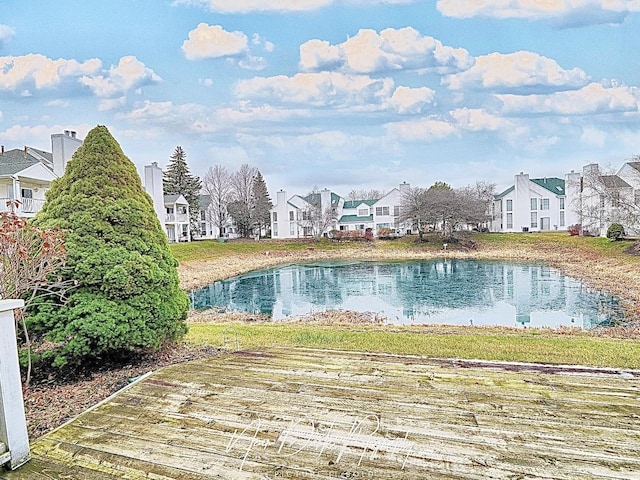 view of pool featuring a water view