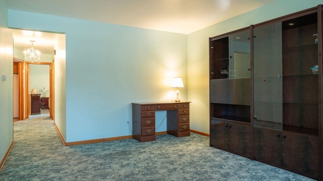 bedroom featuring light colored carpet and a chandelier