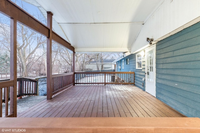 view of snow covered deck