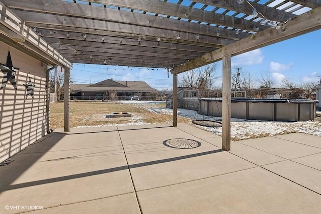 view of patio featuring a pergola