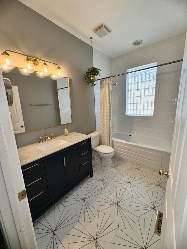 full bath featuring shower / bath combo, visible vents, toilet, tile patterned floors, and vanity