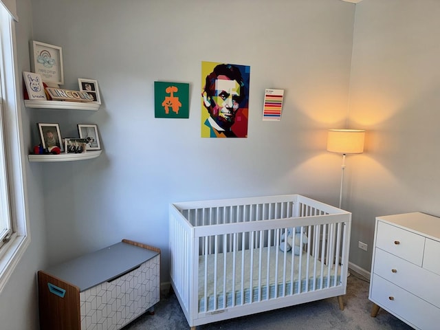 carpeted bedroom with baseboards