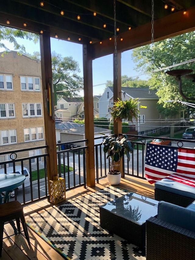 balcony featuring a residential view