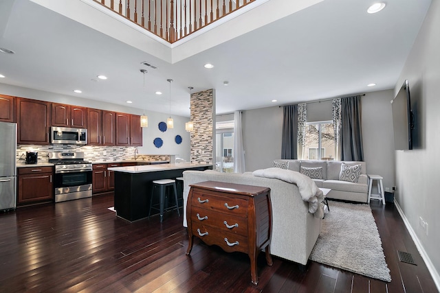 living room featuring dark hardwood / wood-style floors