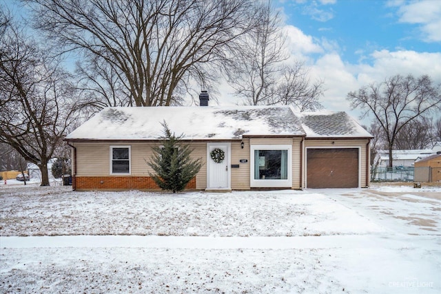 ranch-style home with a garage