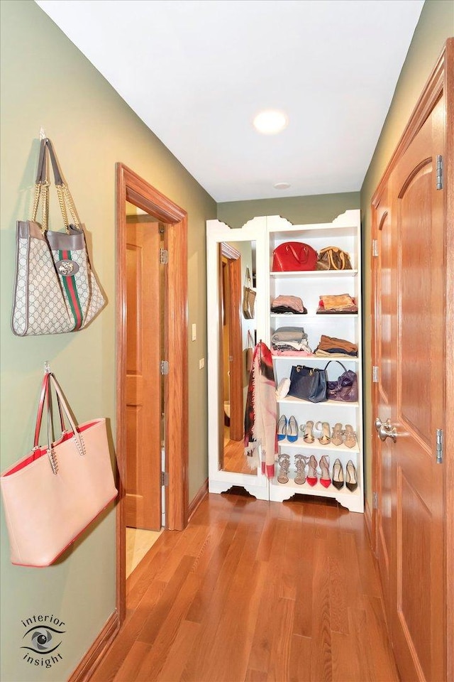 hallway featuring light wood-type flooring