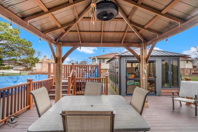 wooden terrace with a gazebo