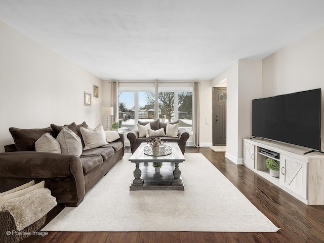 living room featuring dark hardwood / wood-style floors