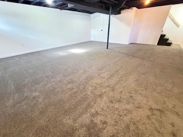 basement with carpet flooring