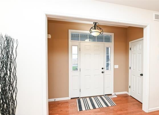 entryway with light wood-type flooring