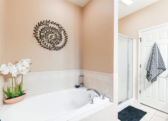 521 E 2700 N Rd, Deland, IL 61839 - bathroom featuring tile patterned floors and independent shower and bath