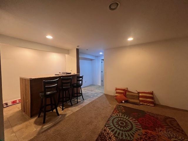 521 E 2700 N Rd, Deland, IL 61839 - bar with white cabinets and light carpet