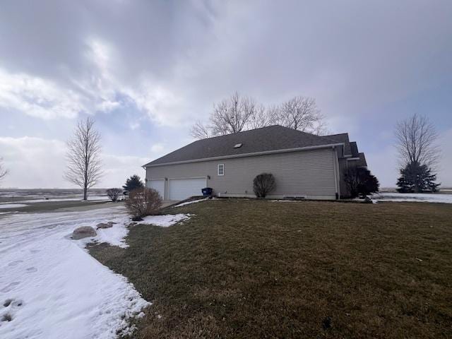 521 E 2700 N Rd, Deland, IL 61839 - rear view of property with a garage and a yard