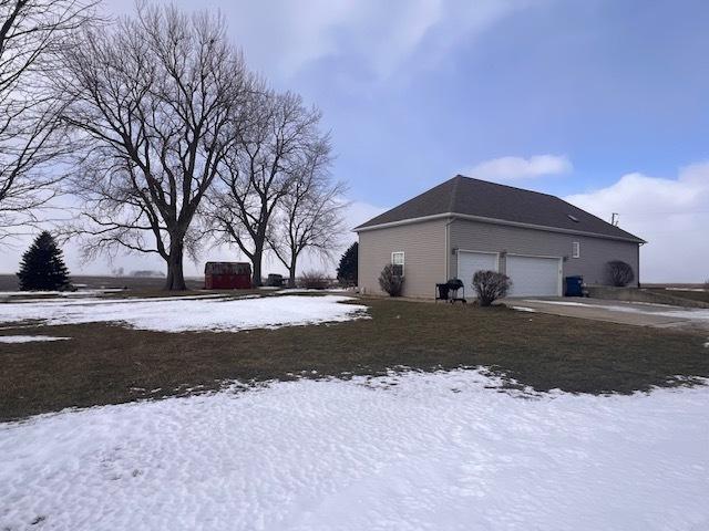 521 E 2700 N Rd, Deland, IL 61839 - view of snowy exterior