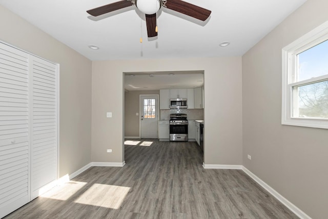 unfurnished living room featuring light hardwood / wood-style floors