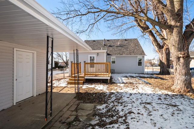 exterior space with a wooden deck