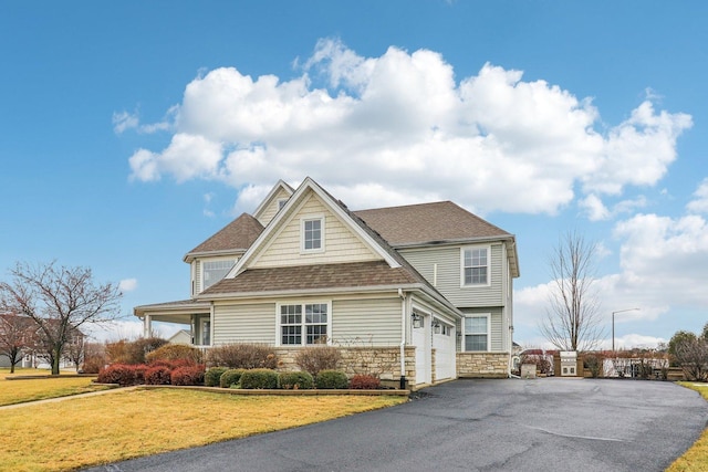 view of front of home with a front yard