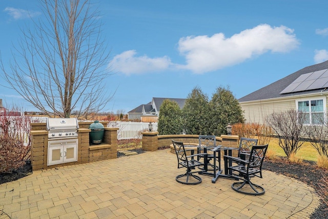 view of patio / terrace with grilling area and an outdoor kitchen