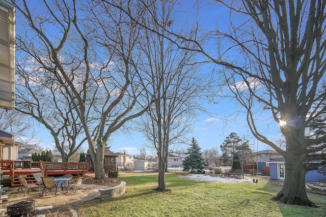 view of yard featuring a deck