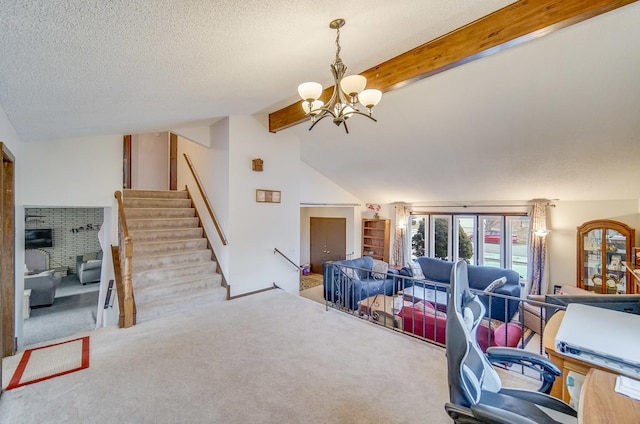 carpeted living room with a chandelier, vaulted ceiling with beams, and a textured ceiling