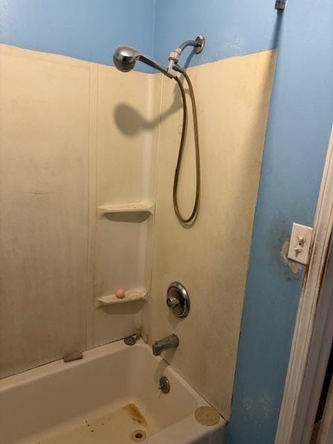 bathroom with shower / washtub combination