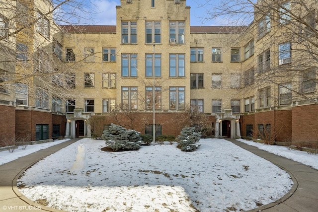 view of snow covered building